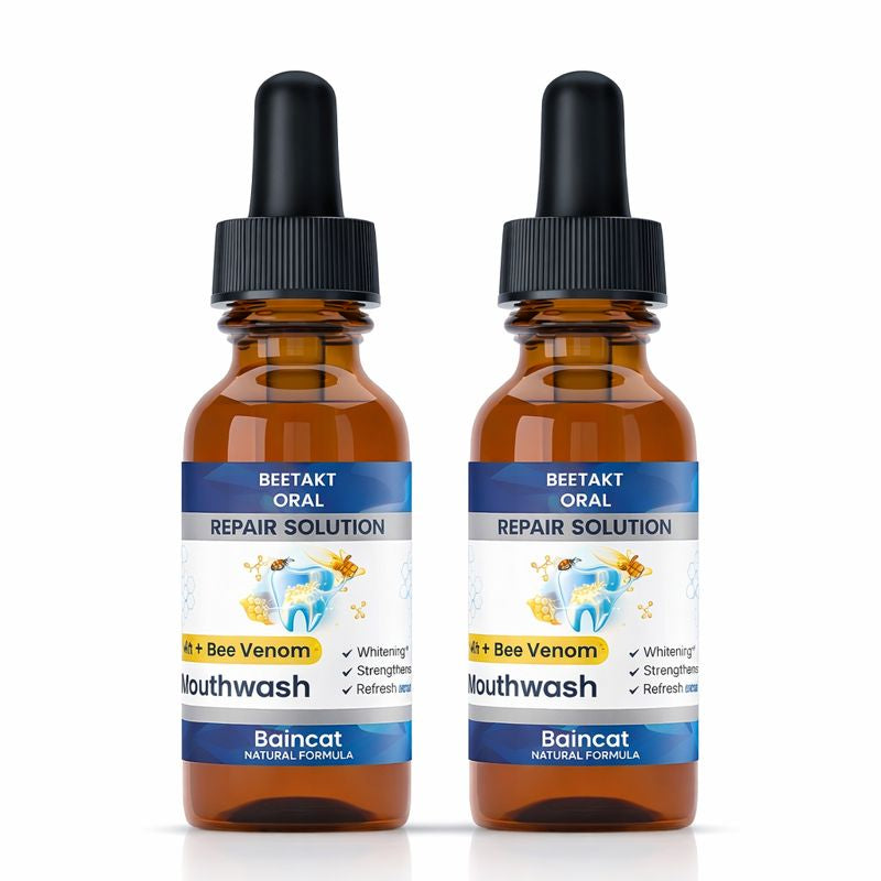 Two 50ml bottles of dental treatment drops standing upright