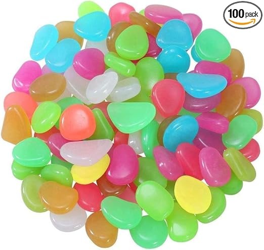 A pile of 100 glow-in-the-dark luminous stones for garden decoration