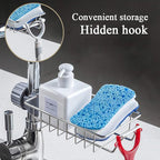 Stainless steel kitchen faucet sponge holder mounted on a sink pipe