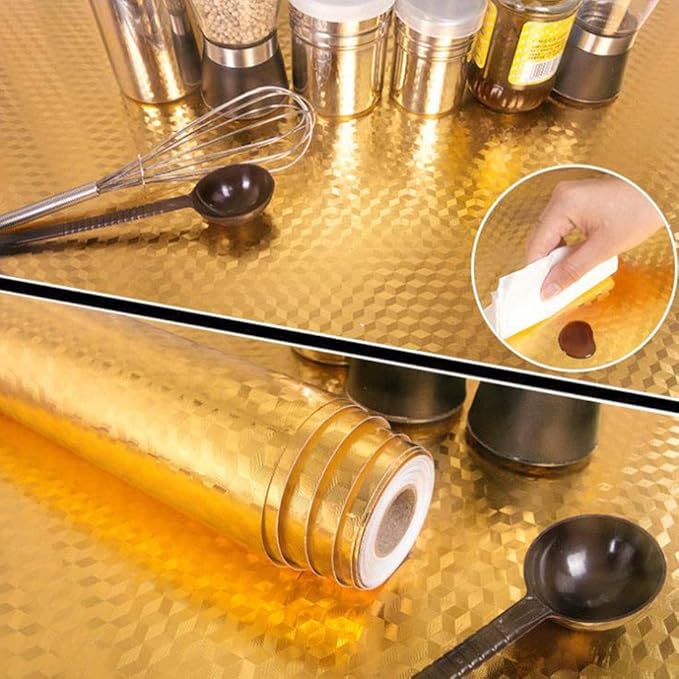A roll of golden aluminum foil designed for protecting kitchen walls near a stove