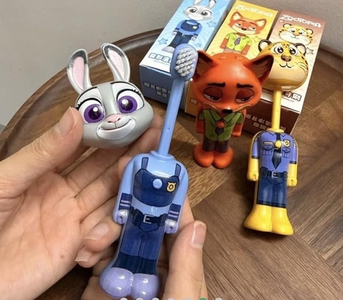 A single kids manual toothbrush featuring a kawaii cartoon theme on the handle with soft bristles