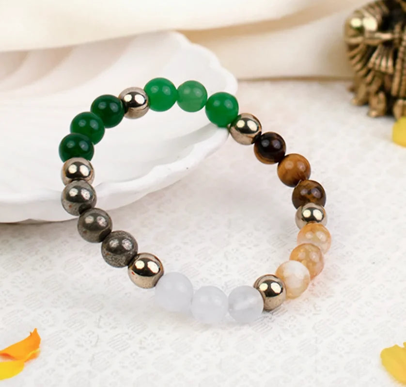 Dhan Yog stretch bracelet made with a mix of polished natural gemstone beads on an elastic cord