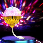Rotating magic ball light with clear prismatic cover on a lamp holder