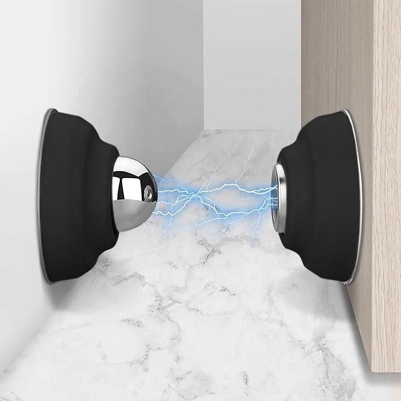 A magnetic door stopper with a metallic finish intended for floor or wall mounting