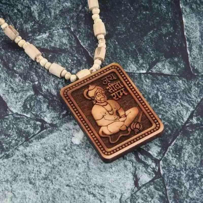 Bageshwar Dham Sarkar Tulsi Mala beads necklace on a neutral background