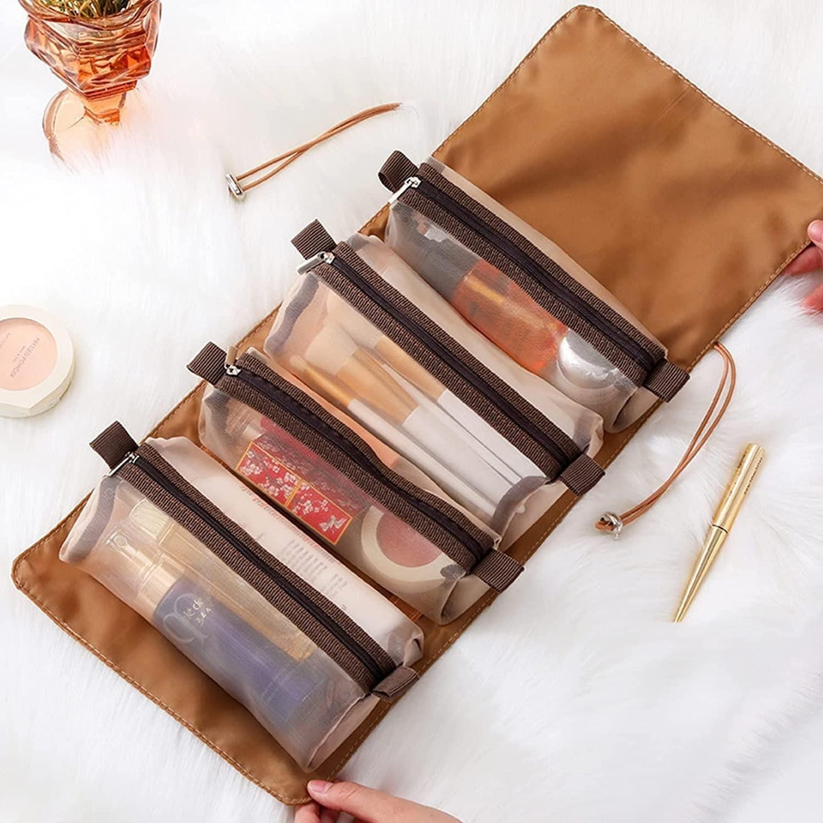 A 4-in-1 detachable hanging toiletry bag in a folded, compact travel configuration.