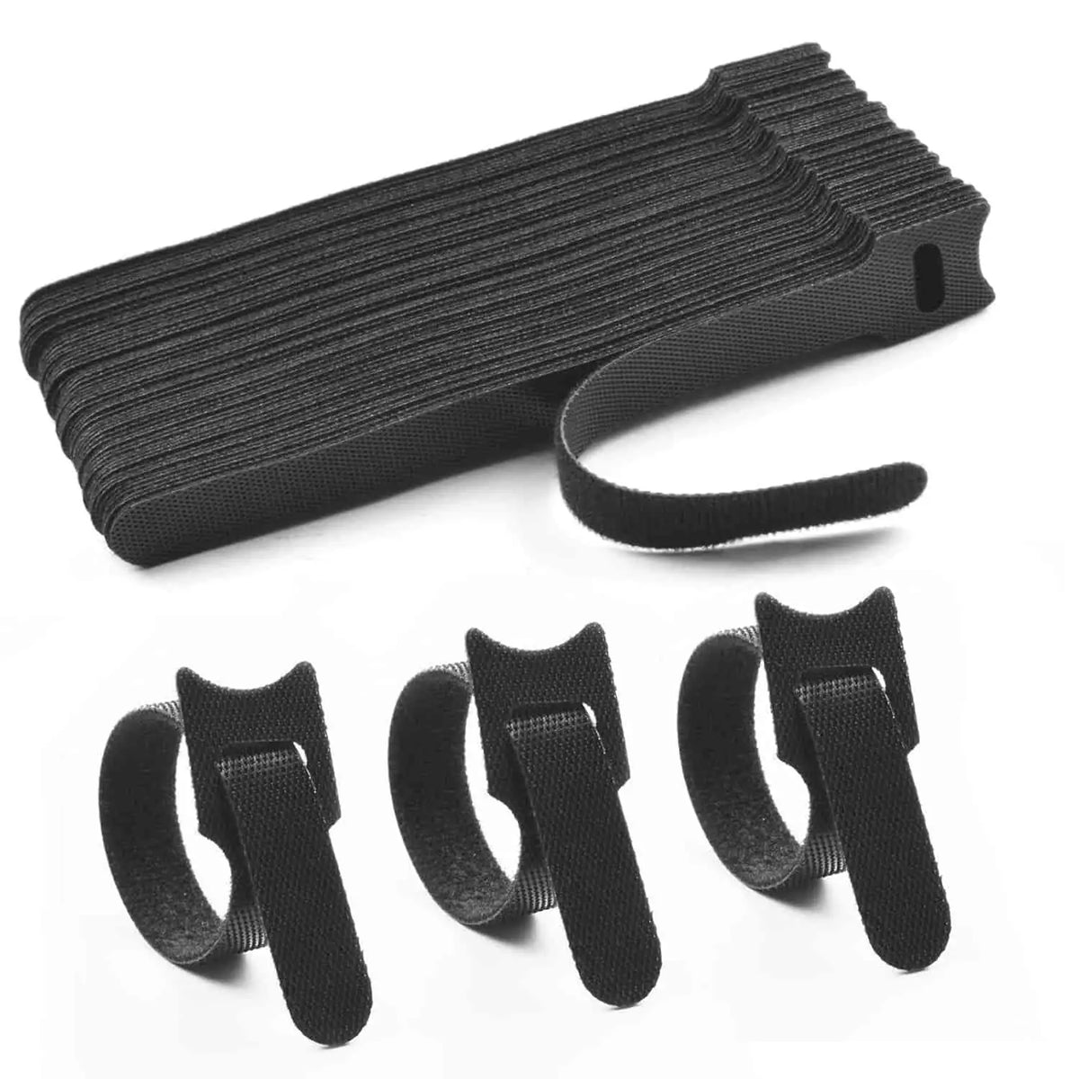 A pack of 60 black velcro cable ties laid out on a flat surface