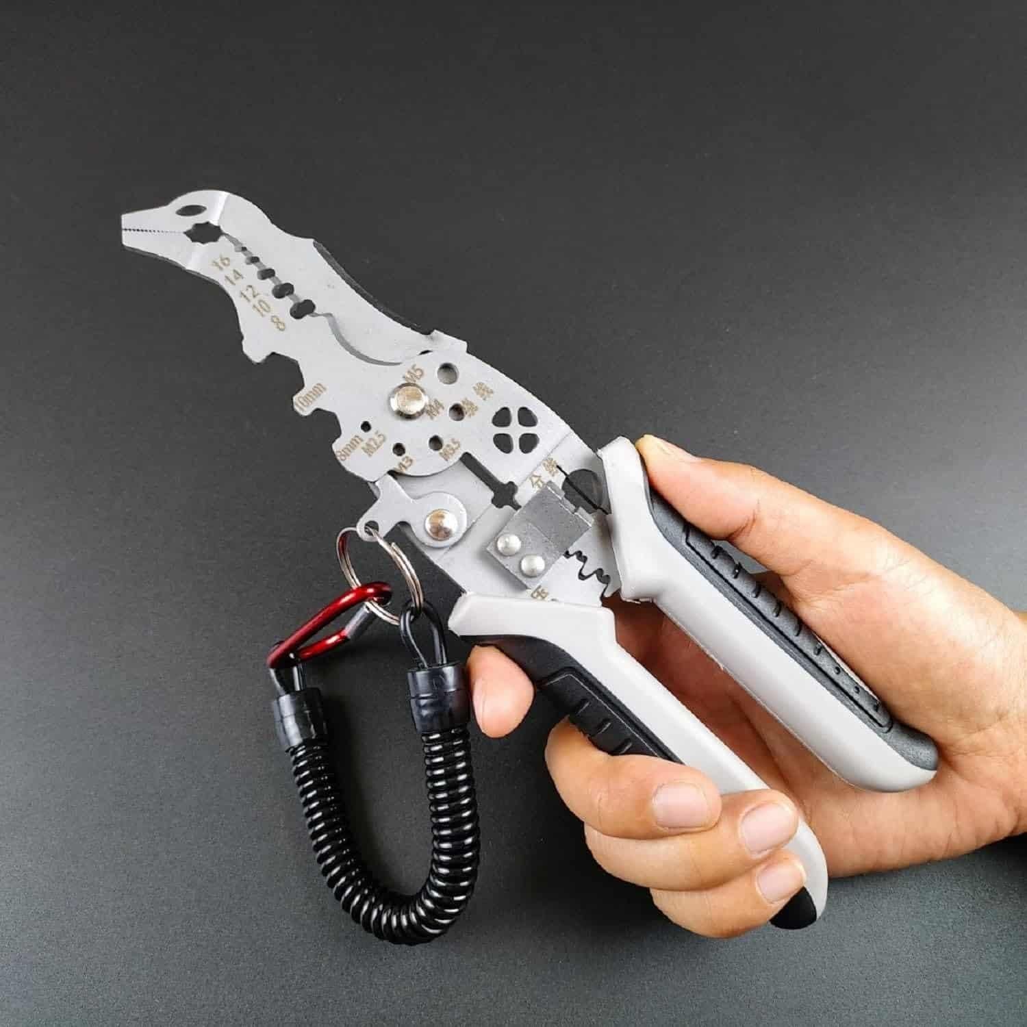 Professional electrician pliers with crimping slots and grip handles