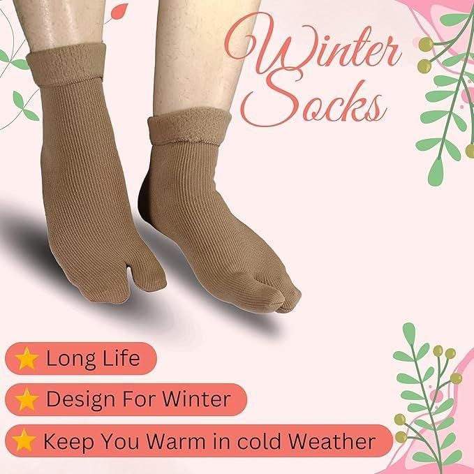 A pair of fleece-lined calf length socks in a standard fit
