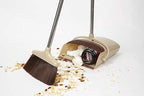 A long-handled broom and dustpan set for indoor floor cleaning
