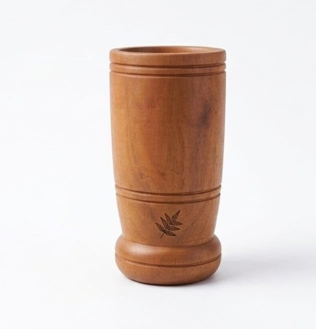 A single 6 inch handcrafted neem wood tumbler showing natural wood grain texture