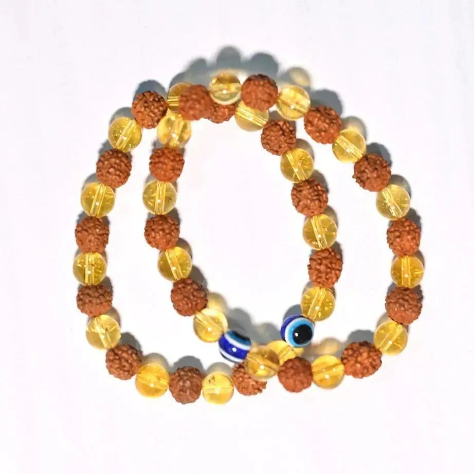 Two Rudraksha and Citrine crystal bracelets displayed on a neutral background