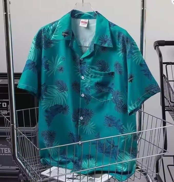 A close-up view of a men's half sleeve shirt made from lycra blend fabric