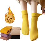 A pair of thick thermal socks in a fabric material designed for cold weather