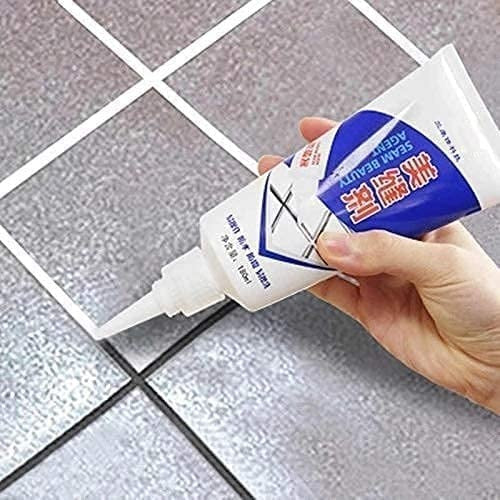 A white squeeze tube for filling tile gaps in a kitchen or bathroom