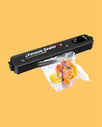 A portable white food vacuum sealer for kitchen storage bags