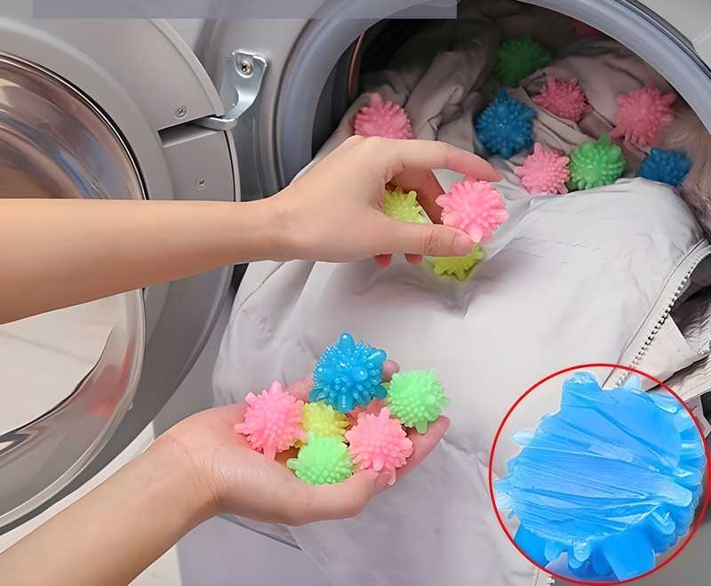A collection of round Corona washing machine cleaning balls used to prevent tangling