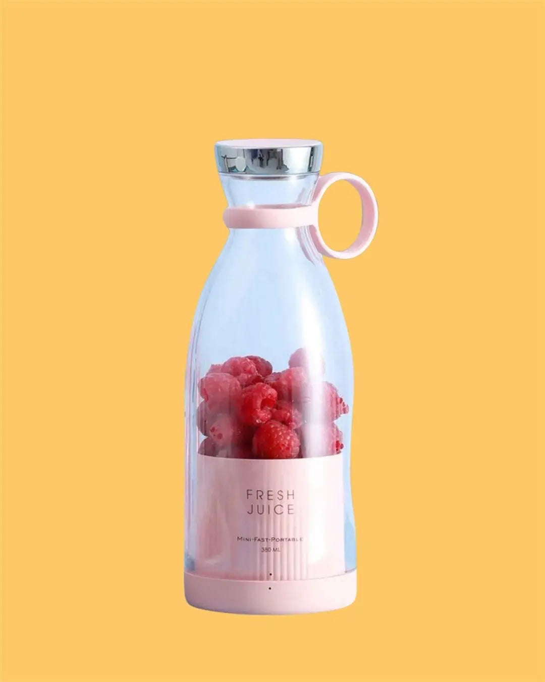 An electric portable mini juicer bottle made of plastic.