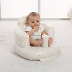 An inflatable plastic baby chair for infants learning to sit up.