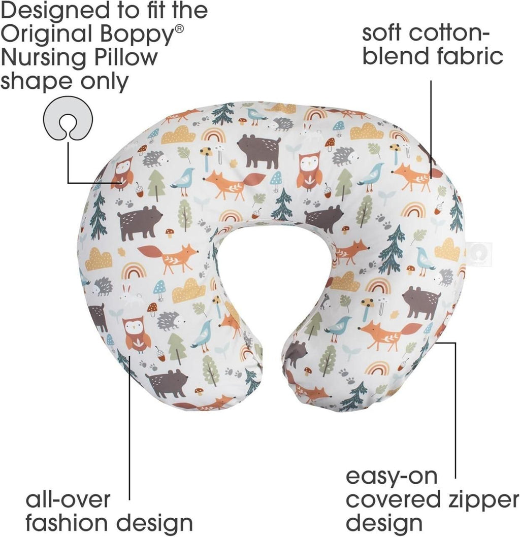 A soft fabric baby nursing pillow cover laid flat on a neutral surface