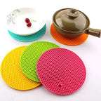 Two heat resistant silicone coasters for kitchen pots and pans