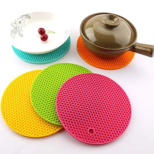 Two heat resistant silicone coasters for kitchen pots and pans