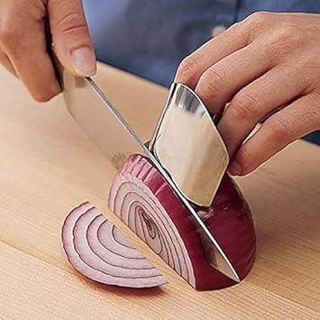 A single stainless steel finger cutting protector used for kitchen safety during slicing and chopping