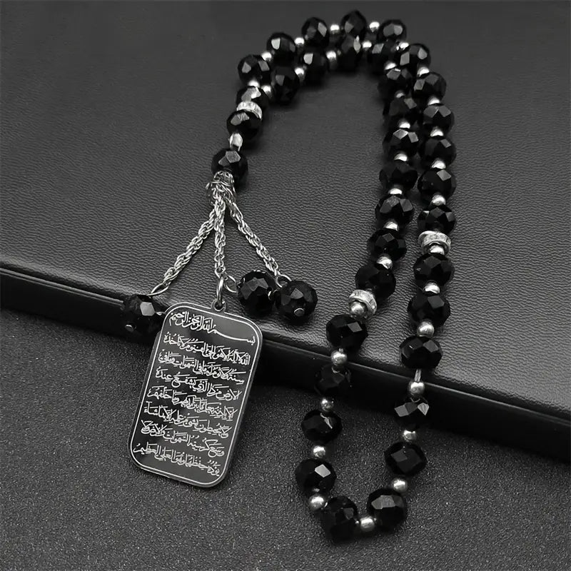 Decorative car hanging pendant featuring steel and colorful bead details hanging on a neutral background