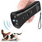 Handheld ultrasonic dog trainer device in black and silver plastic