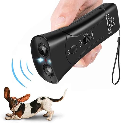 Handheld ultrasonic dog trainer device in black and silver plastic