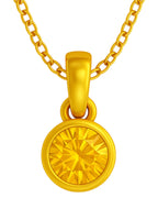 A close up view of a citrine yellow birthstone pendant hanging from a gold plated chain on a white background.