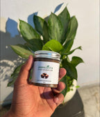 Two containers of Jamalgota Ayurvedic Hair Growth Powder