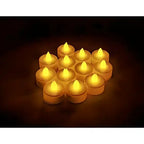 A set of twelve small white LED tea light candles made from plastic