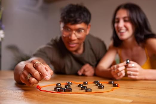A magnetic tabletop board game with magnetic pieces for family play
