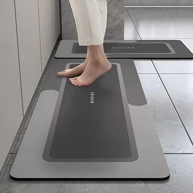 A set of two kitchen floor mats in assorted random designs and colours