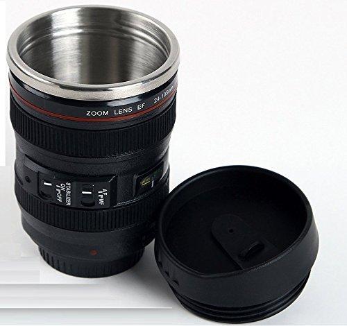 A black camera lens coffee mug with a lid and stainless steel interior on a plain background