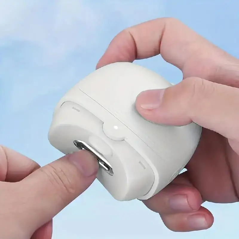 Rechargeable electric nail clipper in a plastic housing