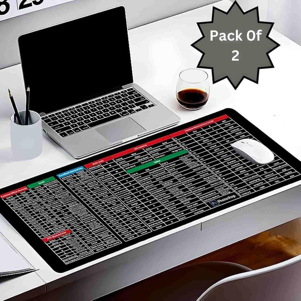 Two extended black rubber gaming mouse pads laid out on a table