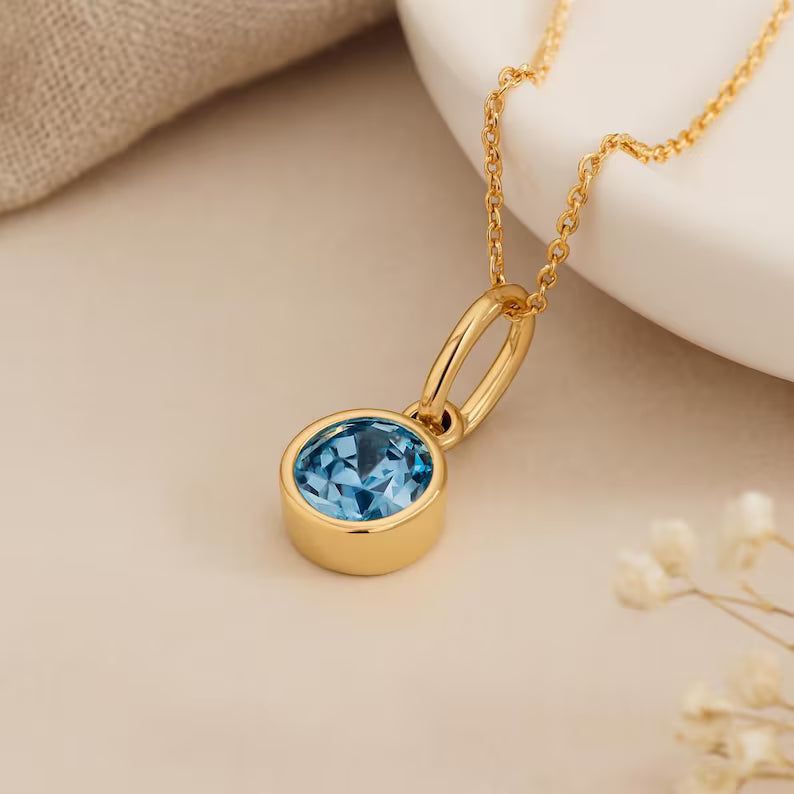 Topaz Blue Birthstone Pendant with Gold Plated Chain