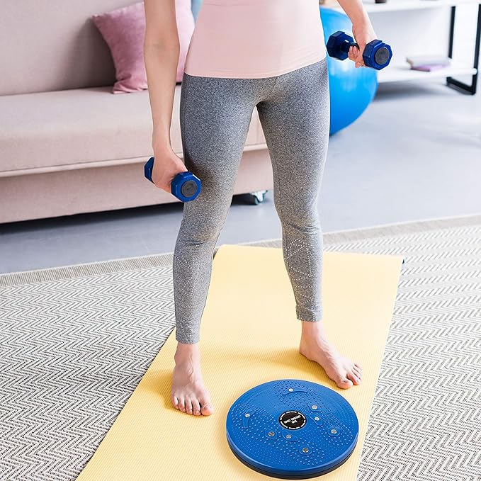 A circular plastic exercise twist board disc shown from a top-down perspective on a plain background.