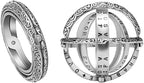 A pair of stainless steel astronomical sphere ball rings in silver finish shown in both folded sphere and expanded ring states.