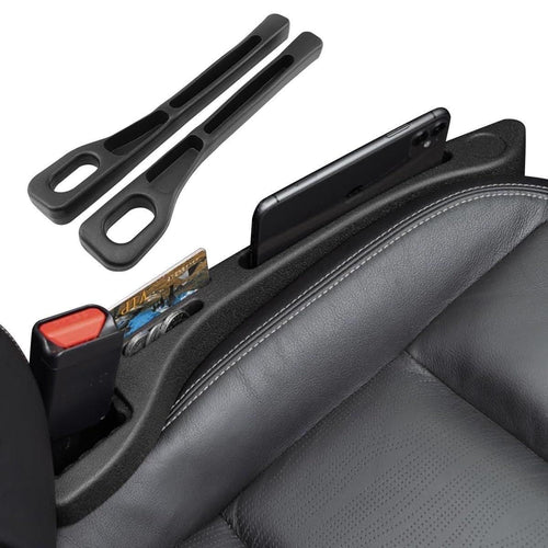 A set of two black car seat gap plugs designed to fit between vehicle seats and consoles