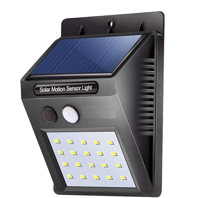 A solar-powered LED wall light with a motion sensor mounted on a brick wall outdoors.