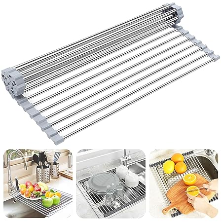 Stainless steel over-sink dish drying rack sitting on a kitchen basin