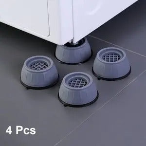 Four round plastic and rubber anti-vibration pads for home appliances