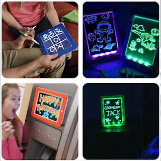 Kids light-up writing tablet with a dark screen and stylus