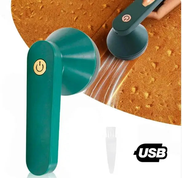 Rechargeable electric fabric lint and fuzz shaver in hand