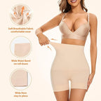 A pack of two beige short shapewear pieces made from a soft cotton blend fabric.